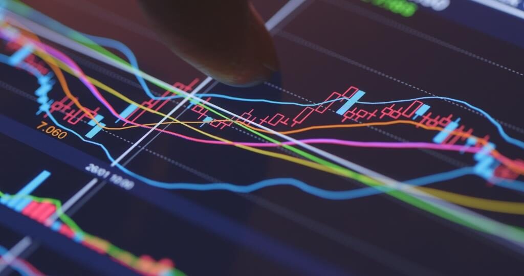 Analysis stock market data on digital screen