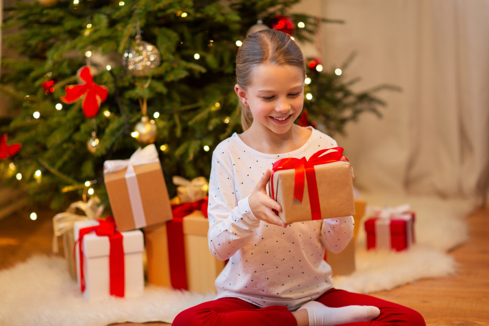 Christmas,,Holidays,And,Childhood,Concept,-,Smiling,Girl,With,Gift